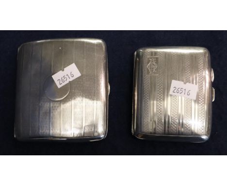 Two silver engine turned cigarette cases with a vacant cartouch. Both Birmingham hallmarks. Approximately 4.9 tory oz. (B.P. 