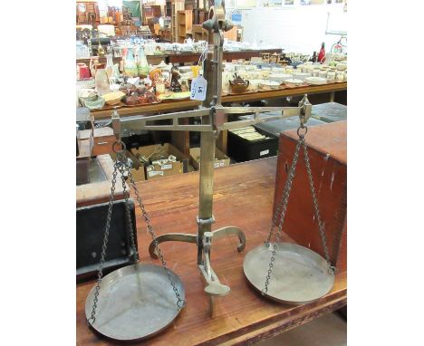 Early 20th century brass balance scales with two hanging pans.(B.P. 21% + VAT) 