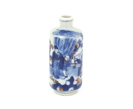 A Chinese snuff bottle of cylindrical form decorated in underglaze blue and yu li hung with a scholar standing beside two boy