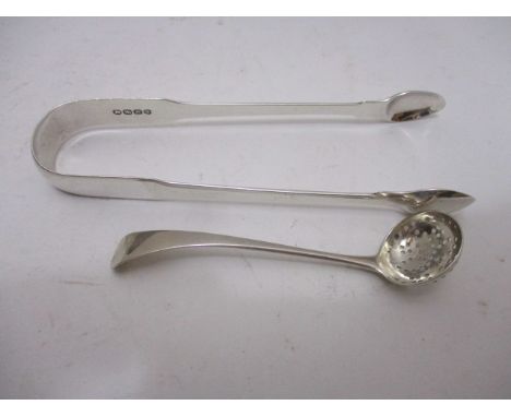 A George III silver pair of sugar tongs by William Eley & William Fearn, London 1781 and George III small sifter spoon by R C