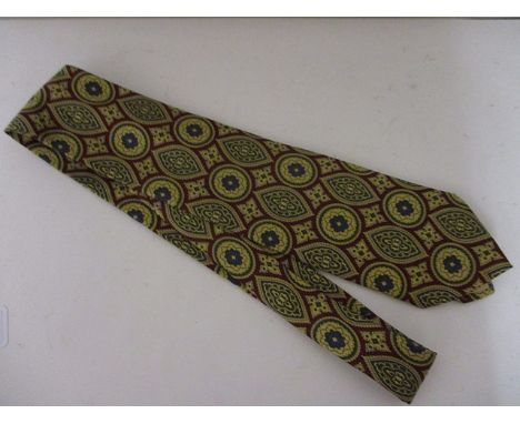 A vintage Liberty silk tie in a navy, gold and maroon colourway