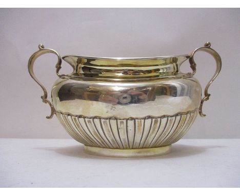 An early 20th century silver sugar basin by Martin, Hall & Co, Sheffield 1903, of oval form with twin, scrolled handles, 4 h,