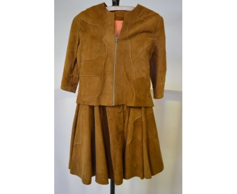 1970s leather garments by Josephine - a patchwork pale tan suede jacket and skirt, a coral red suede shirt dress, a sage gree