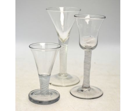 A Georgian wine glass with drawn trumpet bowl, air twist stem, domed foot and rough pontil, 18 cm high to/w a  wine glass wit