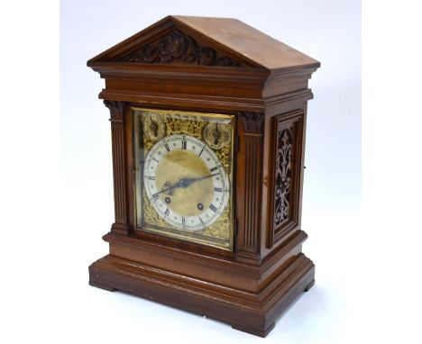 W & H & Son, a late 19th century walnut cased architectural cased eight-day mantel clock, the two train movement striking the