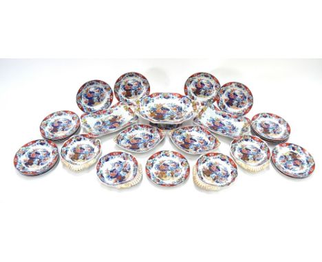 A Spode Imari part-service, decorated with floral arrangements, comprising: four shell-shaped vegetable serving dishes; eight