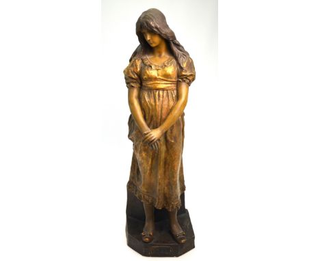 A Goldscheider cold painted terracotta figure of a young maiden, titled 'Mignon', incised signature, applied rectangular mark