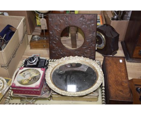 An early 20th Century shaving stand carved picture frame, Bakelite clock, 19th Century oak candle box, a vintage Kodak Cresta
