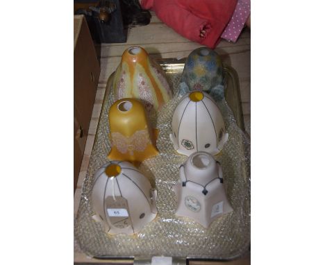 Six assorted bell shaped coloured glass light shades. 