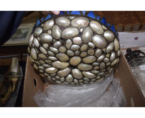 An Early 20th Century American arts and crafts mother of pearl and blue glass hanging light shade.Condition1 shell broken. Sm