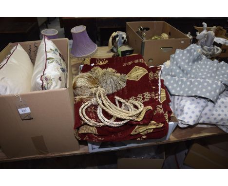 A collection of curtains and cushions to include a pair of silkwork cusions a pair of gilt decorated burgandy curtains and ti