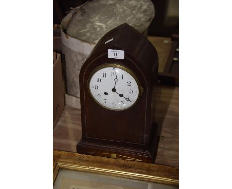 An Edwardian inlaid mahogany mantel clock with white enameled dial and 2 train movement. 