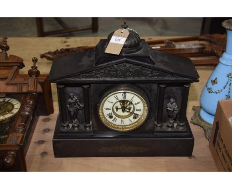 A Victorian Architectural slate mantel clock with a white enamel dial, Two train movement flanked by columns and figures. 