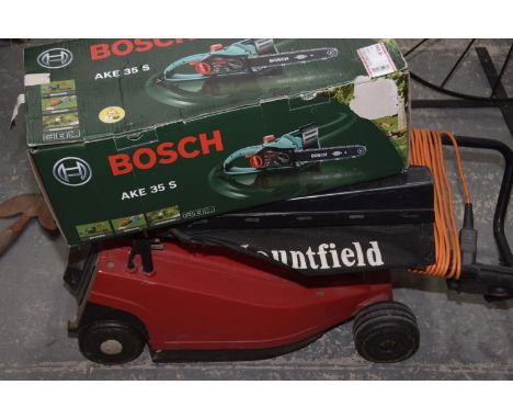 A Mountfield electric rotary lawnmower and a boxed as new Bosch AKE 35 S electric chainsaw. (2) 