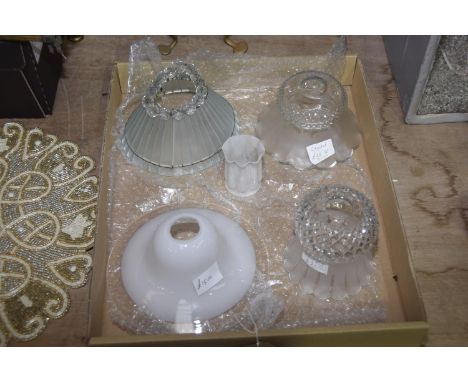 Five early 20th Century coloured glass light shades. 