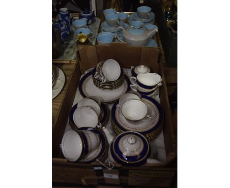 A Royal Worcester Regency tea and dinner service to include teapot, cups, saucers, side plates, sugar basin, milk jugs etc., 