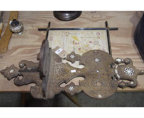 A Victorian needlework sampler, Signed A Evans, aged 11 1897 along with a mother of pearl inlaid hardwood  wall bracket. 2 It