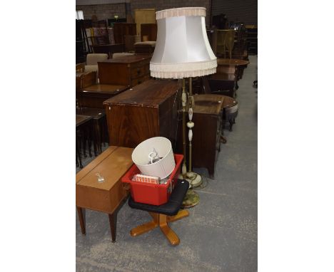 A mid 20th Century teak sewing table and effects, a leather topped stool and two onynx lamp standards. 