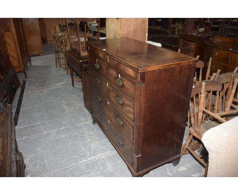 George IV mahogany chest of two short and three long drawers on splayed bracket feet. 