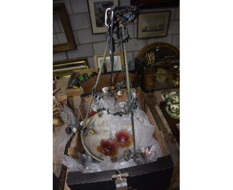 A French art nouveau ceiling light fitting having an alabaster domed shaped shade supported by three rope twist metal arms ea