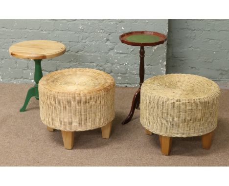 Two wine tables with tripod base along with a pair of wicker footstools.