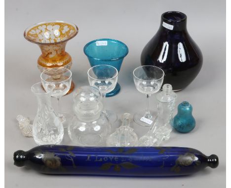 A quantity of collectable glasswares including a Victorian rolling pin, Bohemian amber vase, hand blown goblet, scent bottles