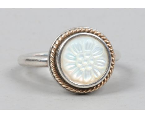 A silver and carved mother of pearl Pandora ring in original box, size N.