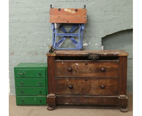 A chest of drawers mounted with table top vices and containing hand tools, along with another painted green chest of drawers 