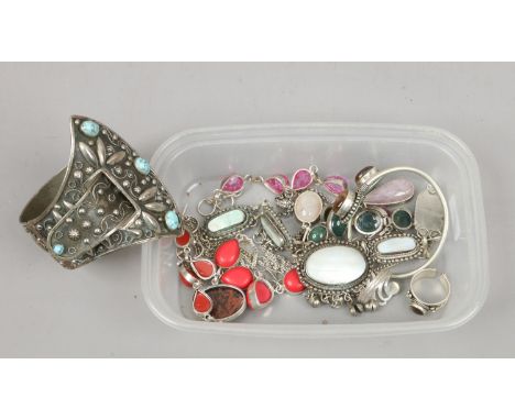 A collection of white metal stone set jewellery including a turquoise set bangle etc.