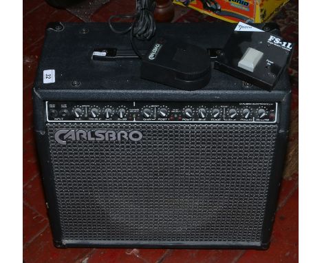 A Carlsbro 100 watt 'stingram' amplifier along with two foot pedal switches.