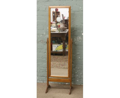 A pine cheval mirror.