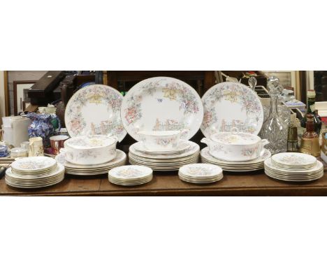 A Royal Worcester bone china dinner service decorated in the secret garden design including tureens, plates, side plates, sau