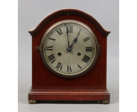 A mahogany cased dome topped eight day mantel clock by Gustav Becker striking on a gong.
