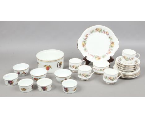 A quantity of Royal Worcester 'Evesham' pattern dinnerwares, along with a Royal Standard bone china part tea service, decorat