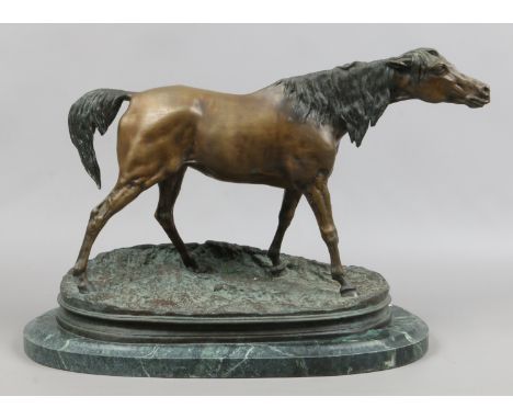 A bronze model of a horse raised on a marble bearing signature P. J. Mene.