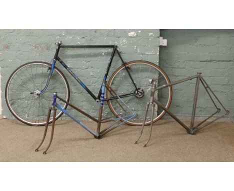 A Carlton racing bike and two racing frames; Carlton and Cinelli of Milan.