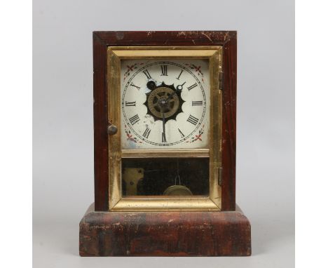 A postmans alarm clock by The Waterbury Clock Co in rosewood and parcel gilt frame.