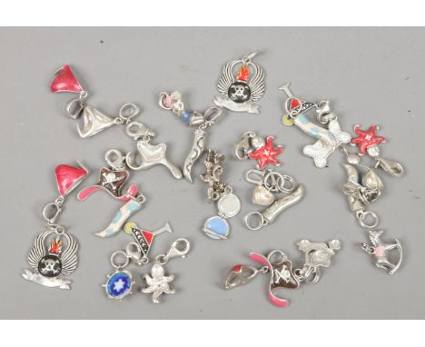 A small box of 925 stamped silver charms with enamel decoration  54 grams gross weight