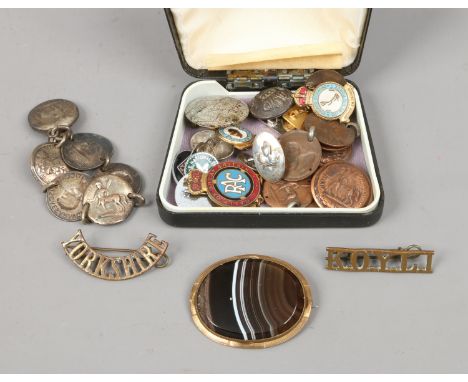 A banded agate brooch, coin bracelet and enamel badges etc including military examples.