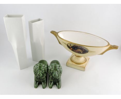 An asymmetrical pair of contemporary white ceramic vases by Rosenthal, of a slewed rectangular form, H. 26cm, together with a