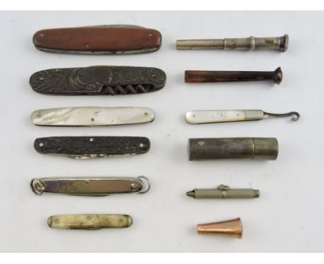 A George V silver toothpick case, a Victorian silver and mother of pearl buttonhook, silver cigar piercer, 9ct cigar holder a