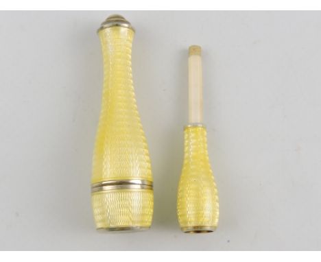 A 1920s continental silver gilt and pale yellow guilloche enamel ladies cigarette holder with  matching outer cover.