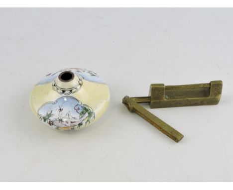 An oriental brass lock, of bar form and engraved with birds, together with an enamel snuff bottle, (2)