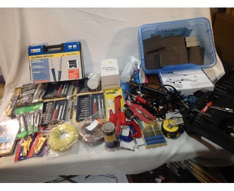Selection of modelling tools, including soldering irons, knives, battery tester, drill bits, airbrush, quantity of sanding bl