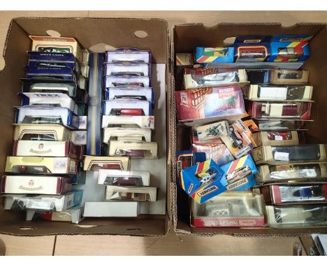 Over sixty boxed diecast models from Lledo/Matchbox, models in excellent condition, storage wear to boxes. UK P&amp;P Group 2