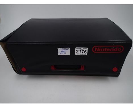 Official Nintendo carry case with two NES controllers and sixteen games to include Pirates by Palcom and The Ultimate Stuntma