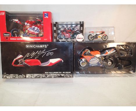 Boxed Minichamps Ducati 996RS 1:12 scale Superbike 2001, signed by Neil Hodgson. Bike and box in excellent condition, plus th