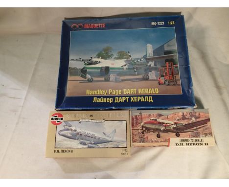 Three 1/72 scale airliner kits, two Airfix D.H Heron, and Maquette Dart Herald, appear complete, unchecked. UK P&amp;P Group 