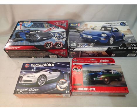 Four model car plastic kits, Airfix Bugatti Chiron and E type Jag, Revell New Type Beetle and Revell Pixar Cars Jackson Storm