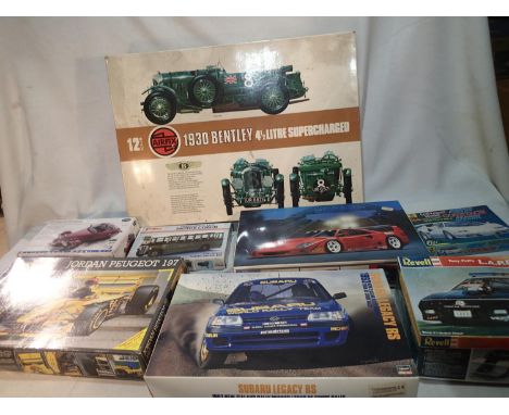 Eight part built car and bus kits, including Airfix 1/12 scale Bentley, plus eighteen built plastic kits including two 1/12 s
